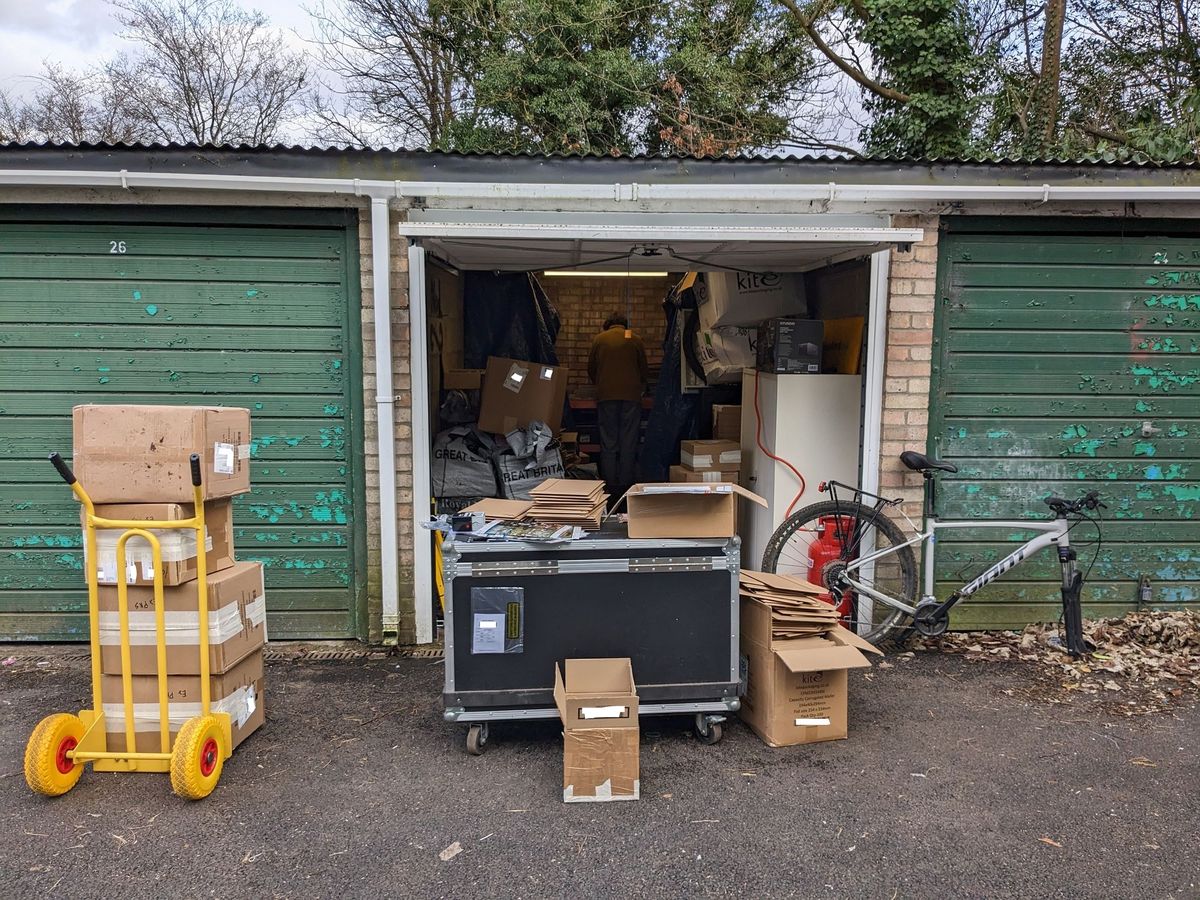 Garage with boxes and cardboard being prepared for packaging